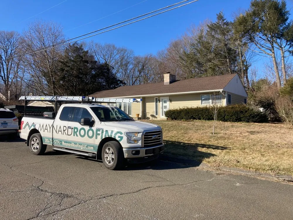 Slide of Maynard Roofing