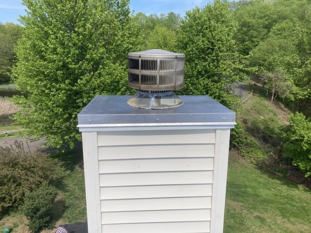 Slide of Maynard Roofing