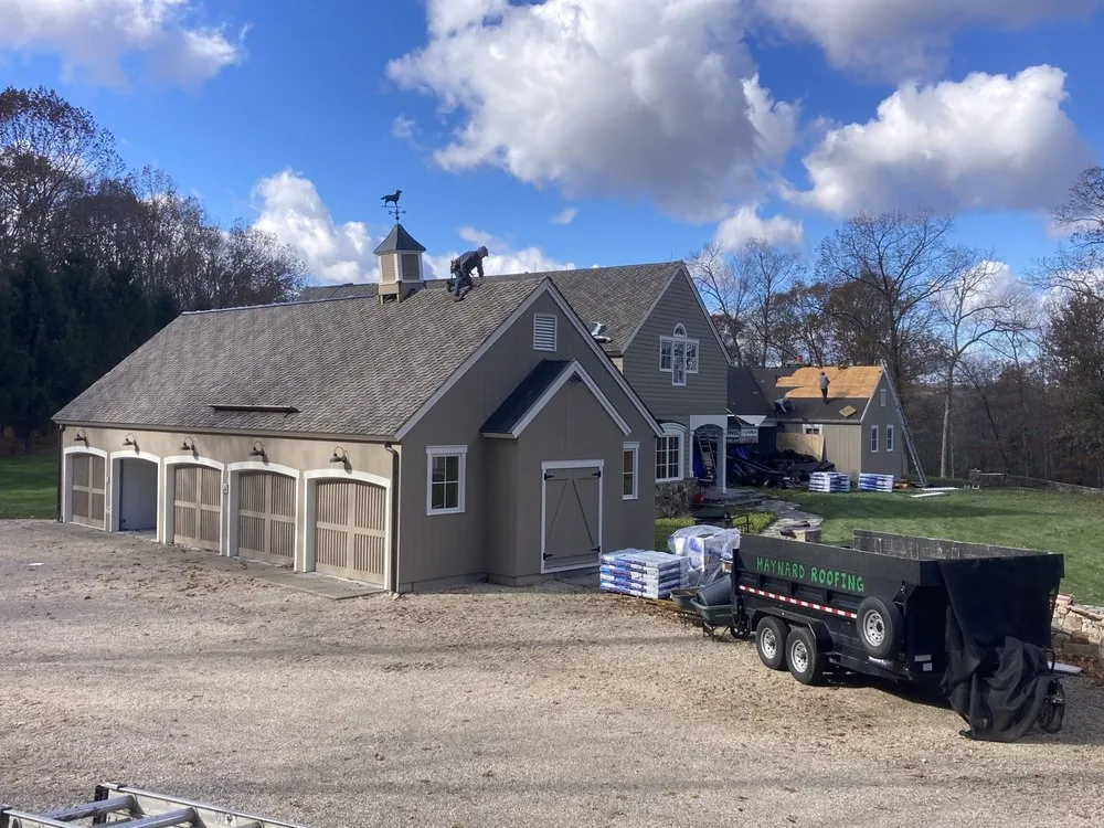Slide of Maynard Roofing