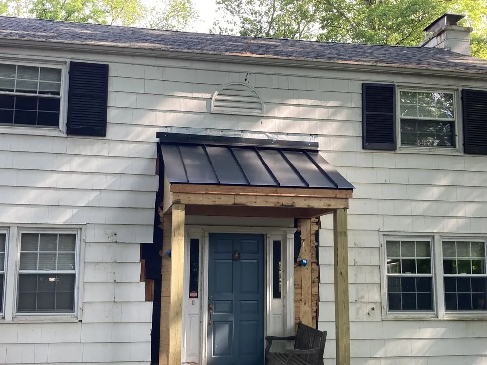 Slide of Maynard Roofing