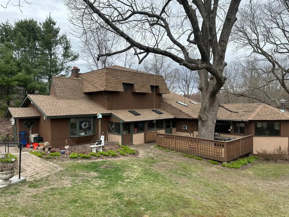 Slide of Maynard Roofing