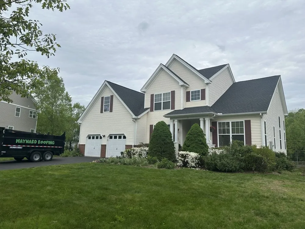 Slide of Maynard Roofing