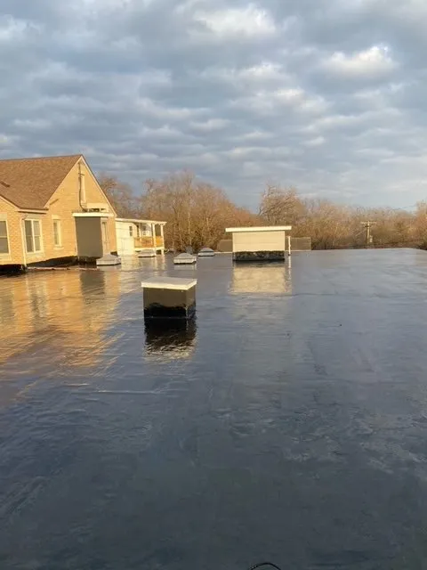 Slide of Mayou Roofing