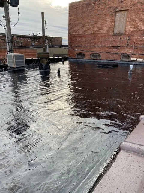 Slide of Mayou Roofing