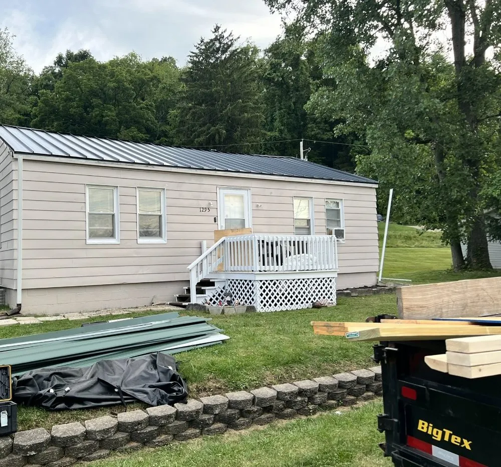 Trusted storm damage roof repair in Etna, OH by Mays-Wilson Construction Company