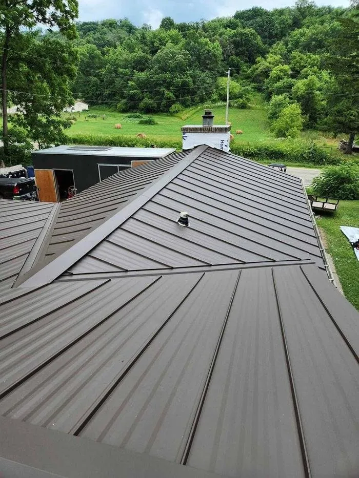 Slide of MB Construction and Steel Roofing