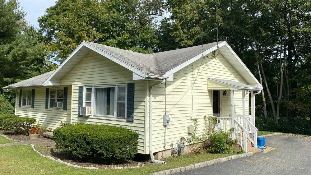 Slide of M&C Construction Roofing & Siding Service