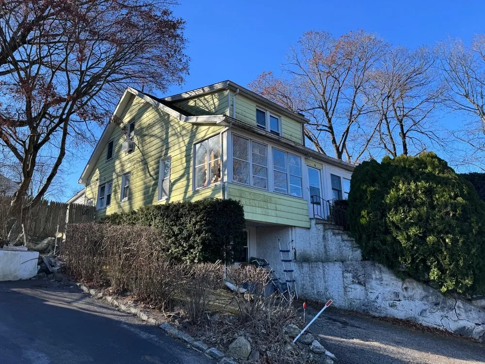 Slide of M&C Construction Roofing & Siding Service