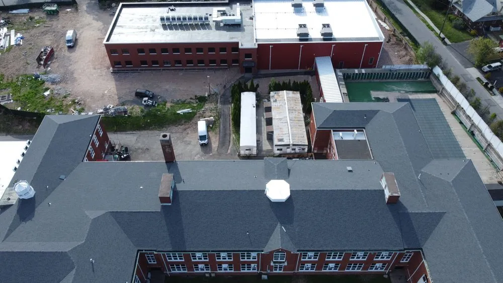 Slide of M&C Construction Roofing & Siding Service