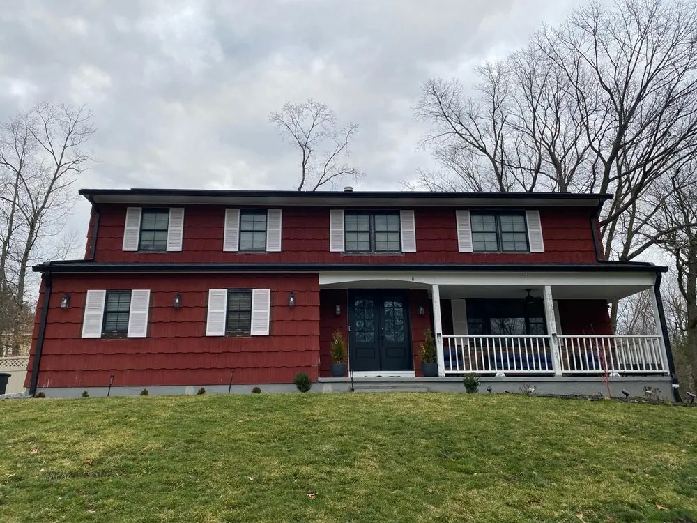 Slide of M&C Construction Roofing & Siding Service