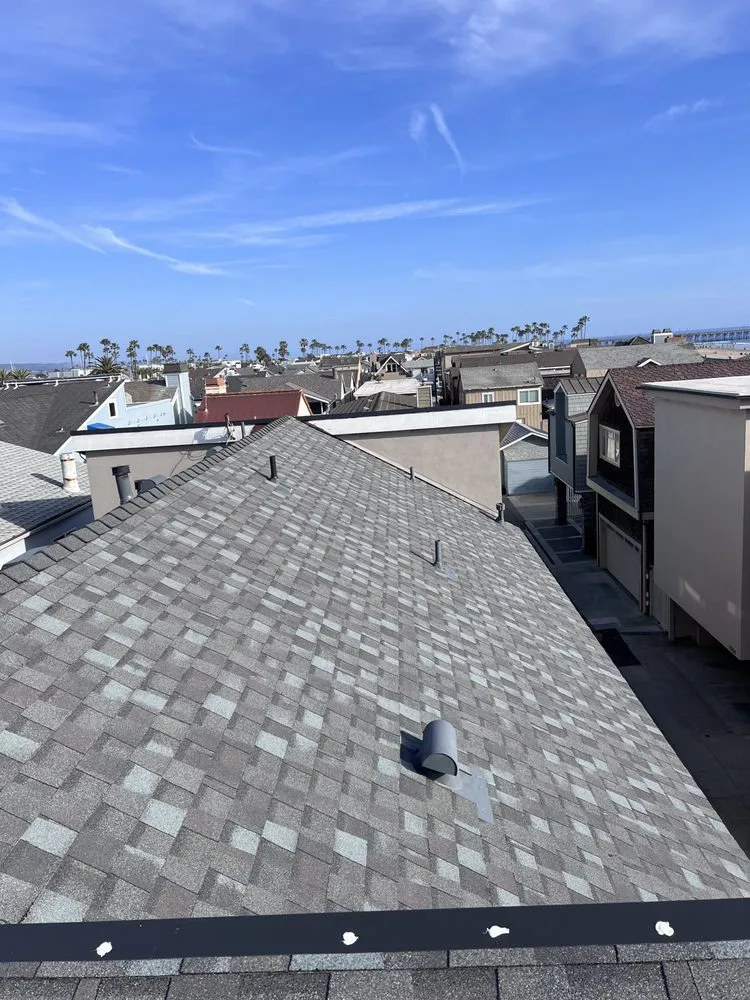 Slide of MC Elite Roofing