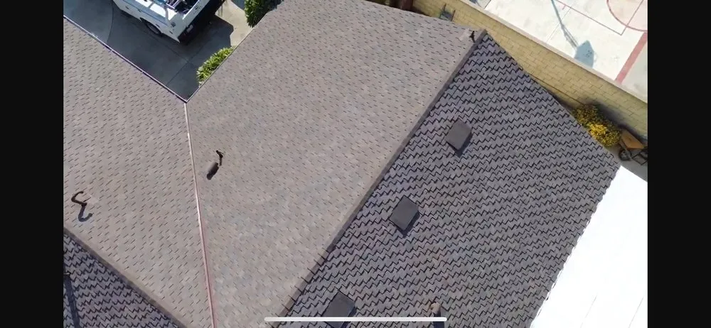 Slide of MC Elite Roofing