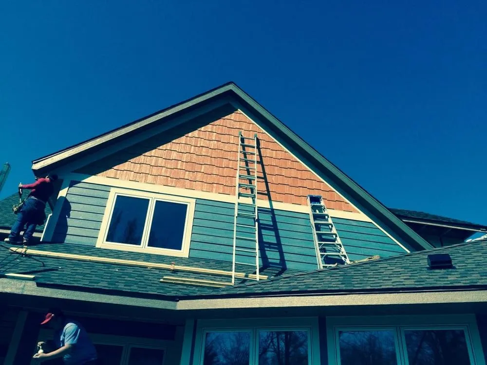 Slide of MC Exteriors