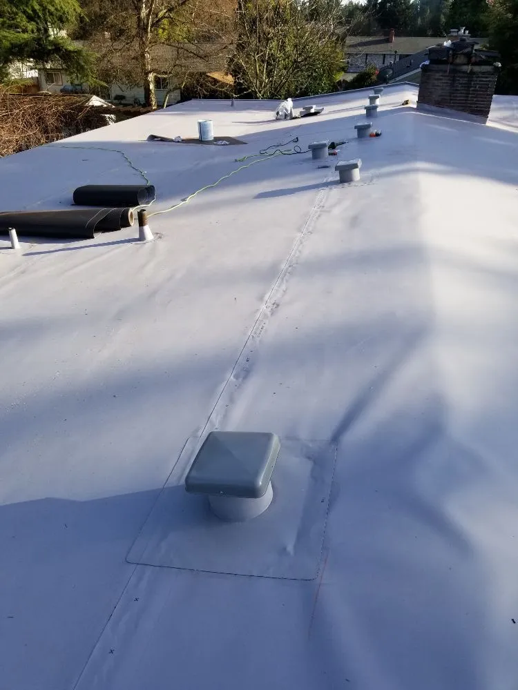 Slide of MC Roofing & Construction