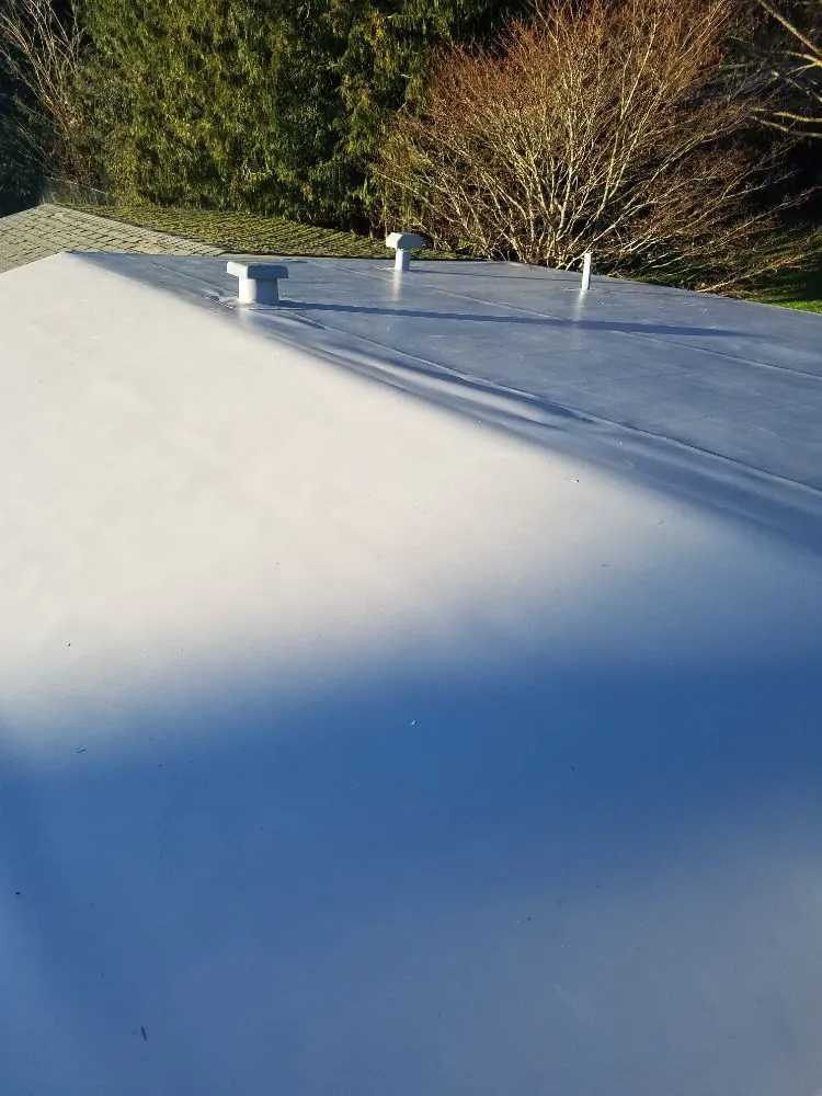 Slide of MC Roofing & Construction