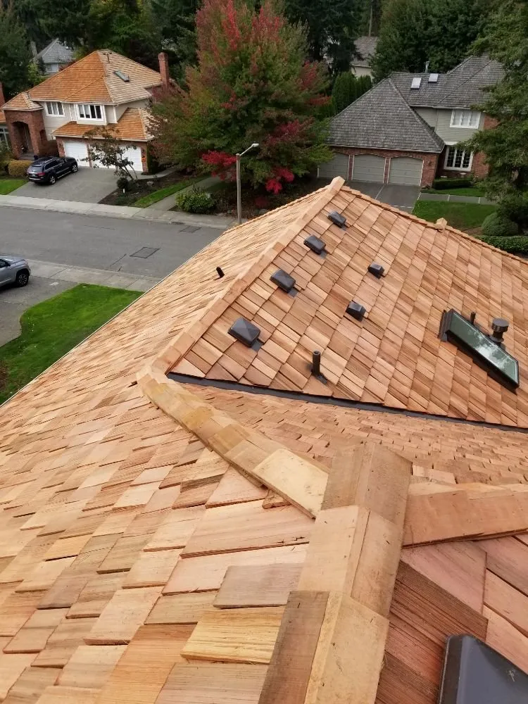 Slide of MC Roofing & Construction