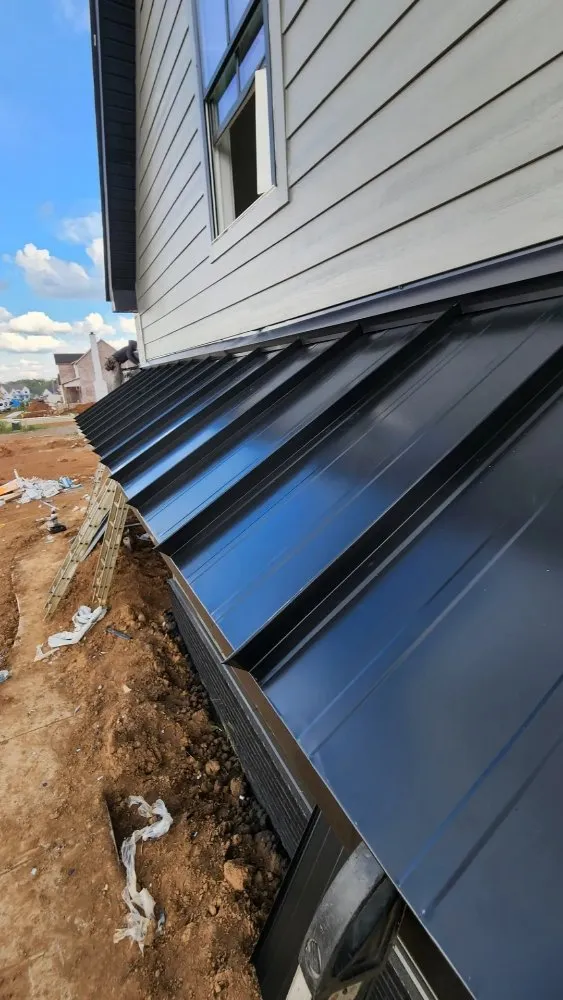 Slide of M&C Roofing