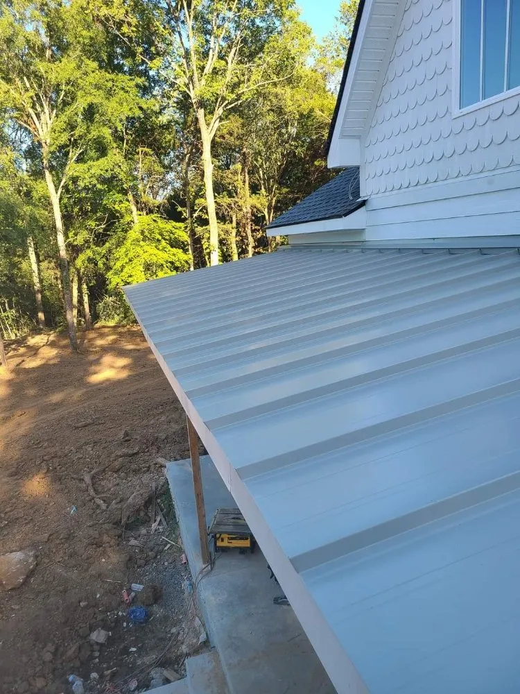 Slide of M&C Roofing