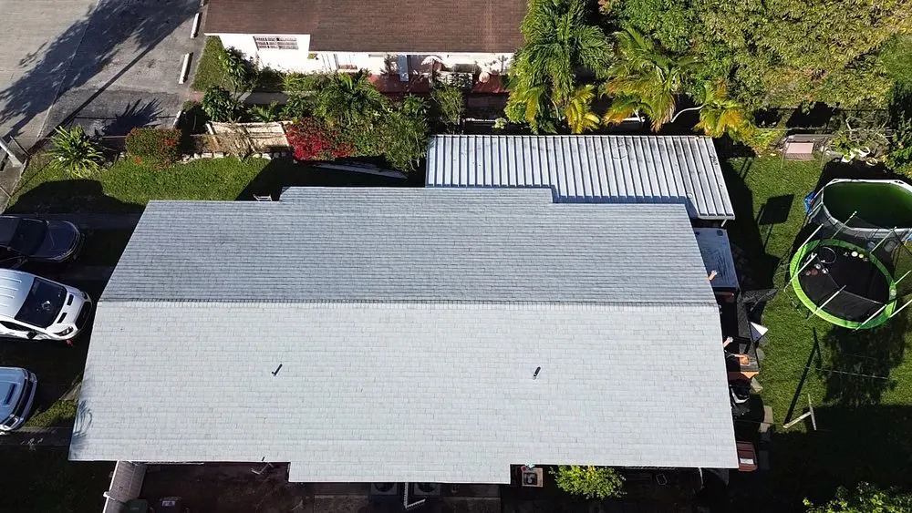 Slide of MC Roofing Service