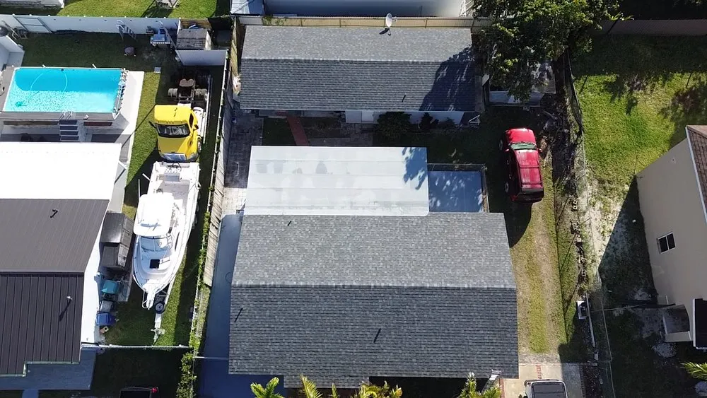 Slide of MC Roofing Service