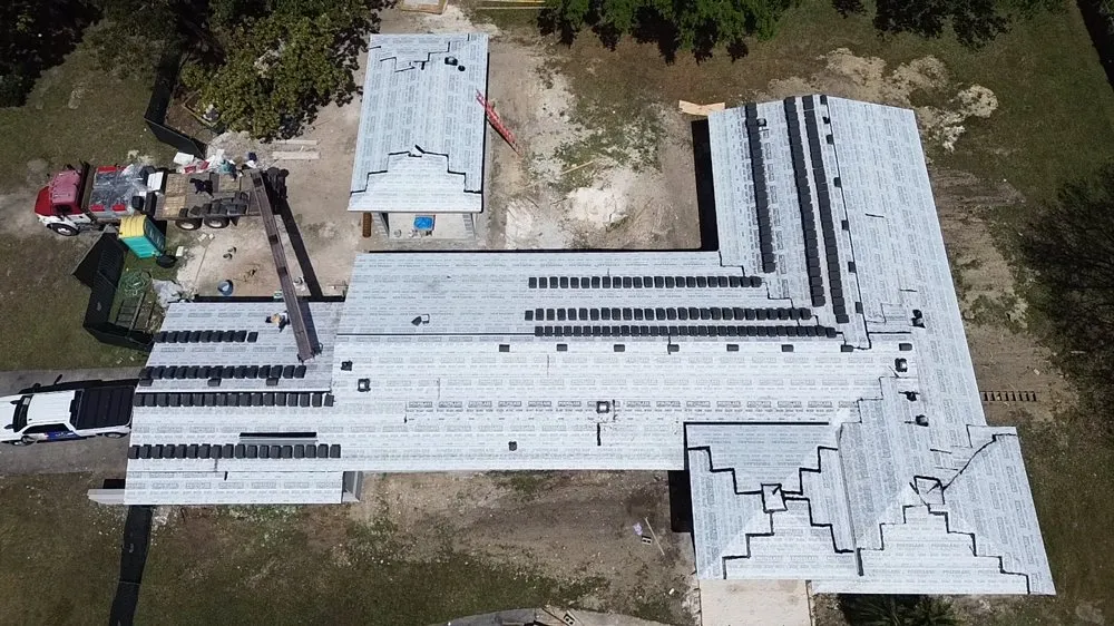 Slide of MC Roofing Service