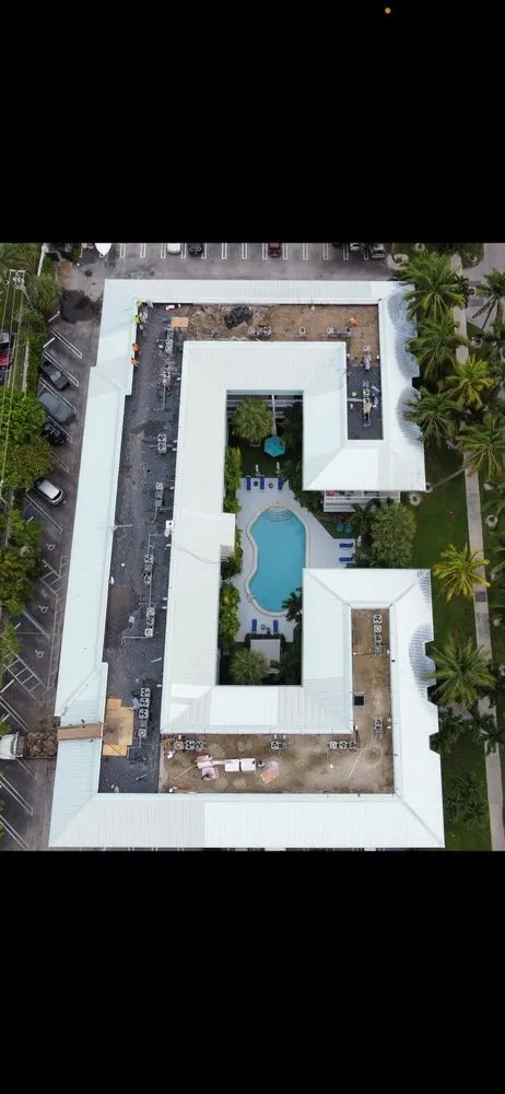 Slide of MC Roofing Service