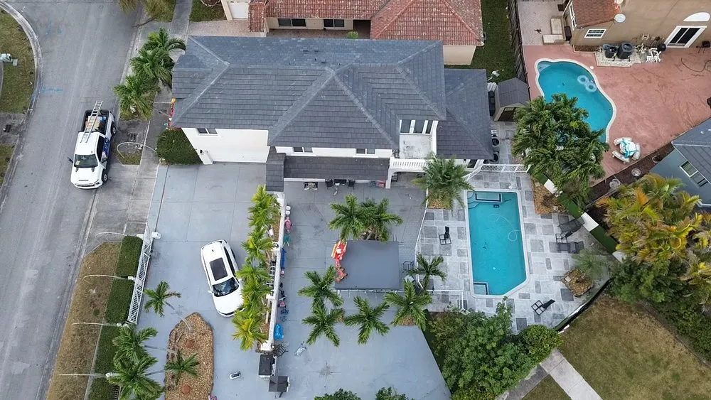 Slide of MC Roofing Service