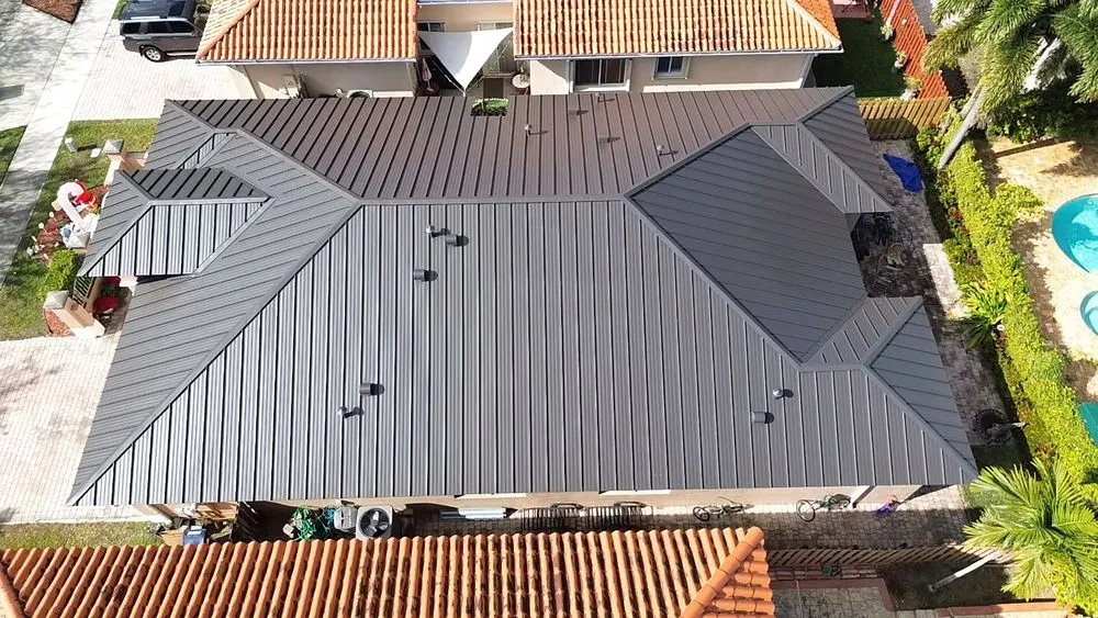 Slide of MC Roofing Service