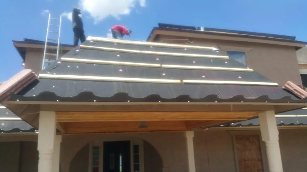 Slide of MC Roofing Services