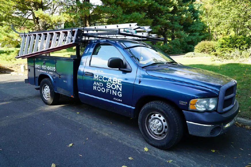 Slide of McCabe and Son Roofing