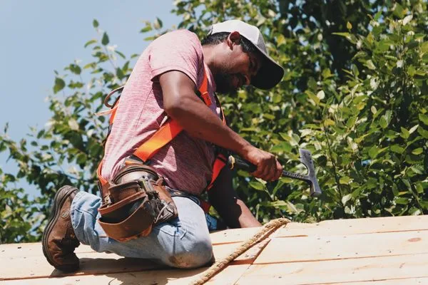 McCann's Roofing & Construction Logo