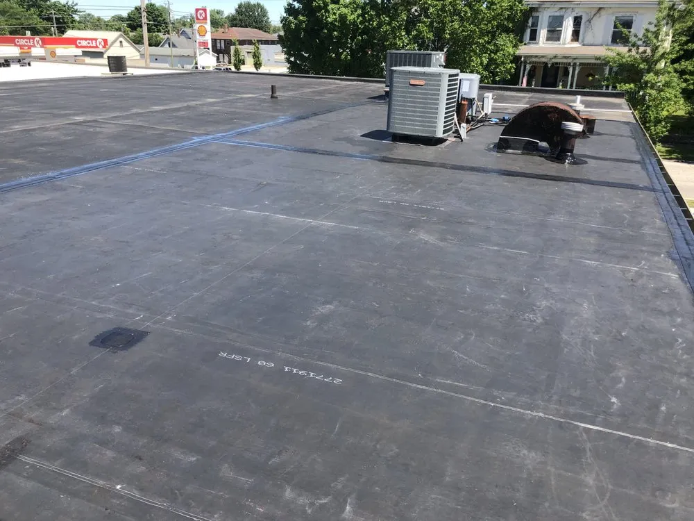 Slide of McCarty Roofing & Restoration