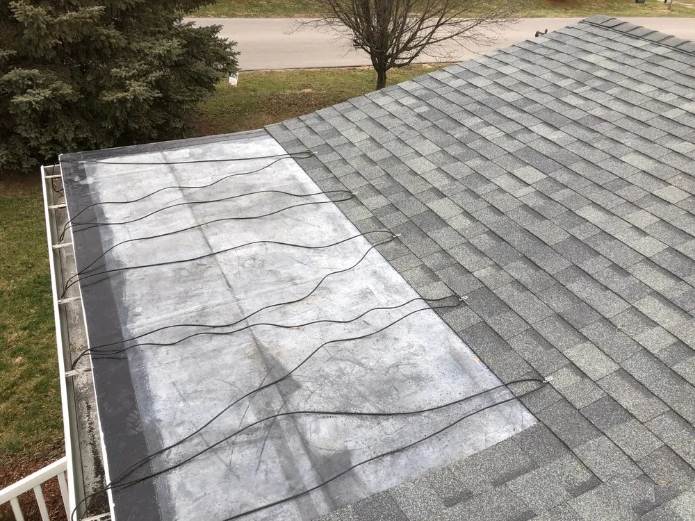 Slide of McCarty Roofing & Restoration