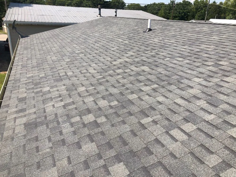 Slide of McCarty Roofing & Restoration