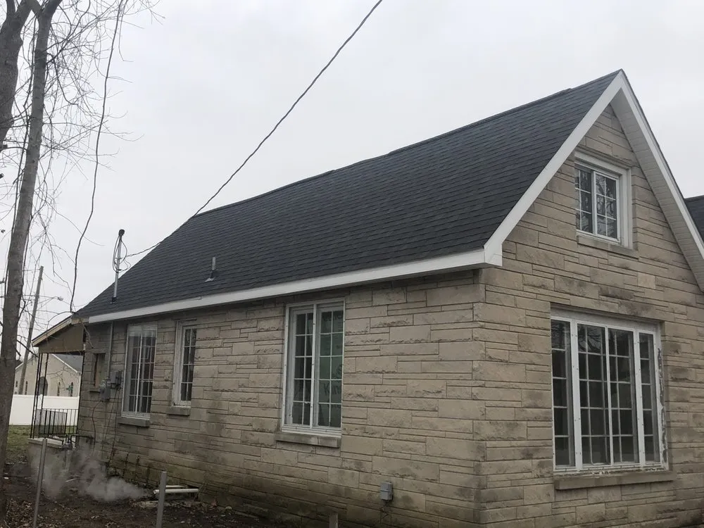 Slide of McCarty Roofing & Restoration