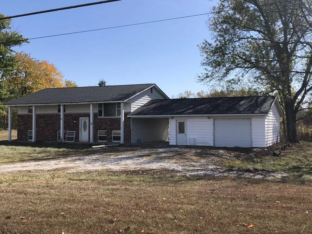 Slide of McCarty Roofing & Restoration