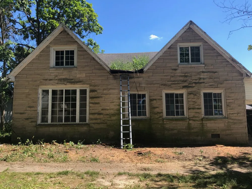 Slide of McCarty Roofing & Restoration