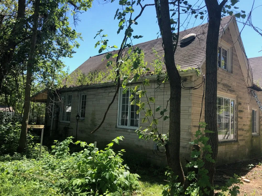 Slide of McCarty Roofing & Restoration