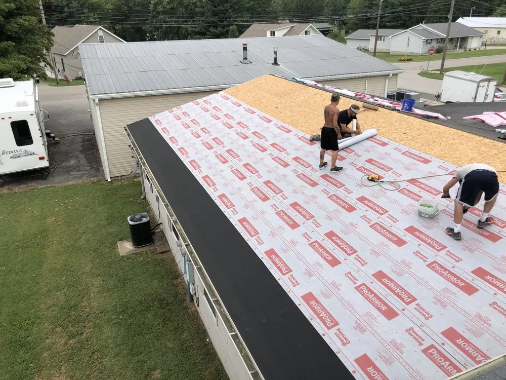 Slide of McCarty Roofing & Restoration