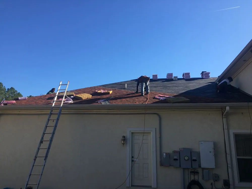 Slide of McCoy Roofing