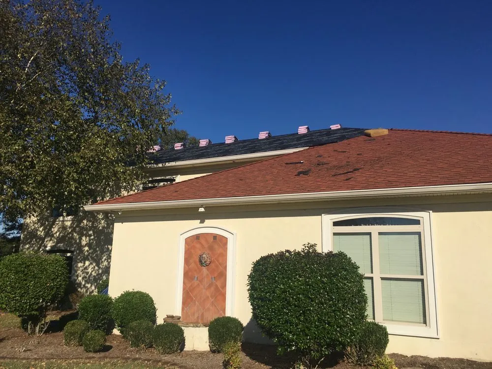 Slide of McCoy Roofing