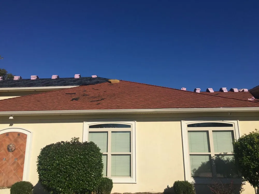 Slide of McCoy Roofing