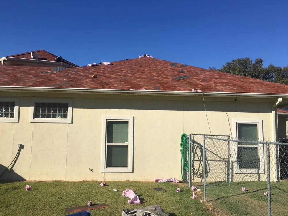 Slide of McCoy Roofing