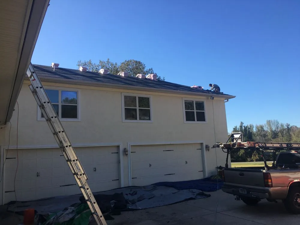 Slide of McCoy Roofing