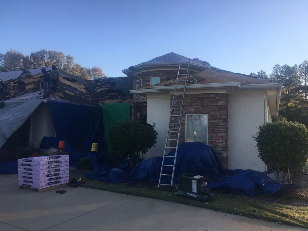 Slide of McCoy Roofing