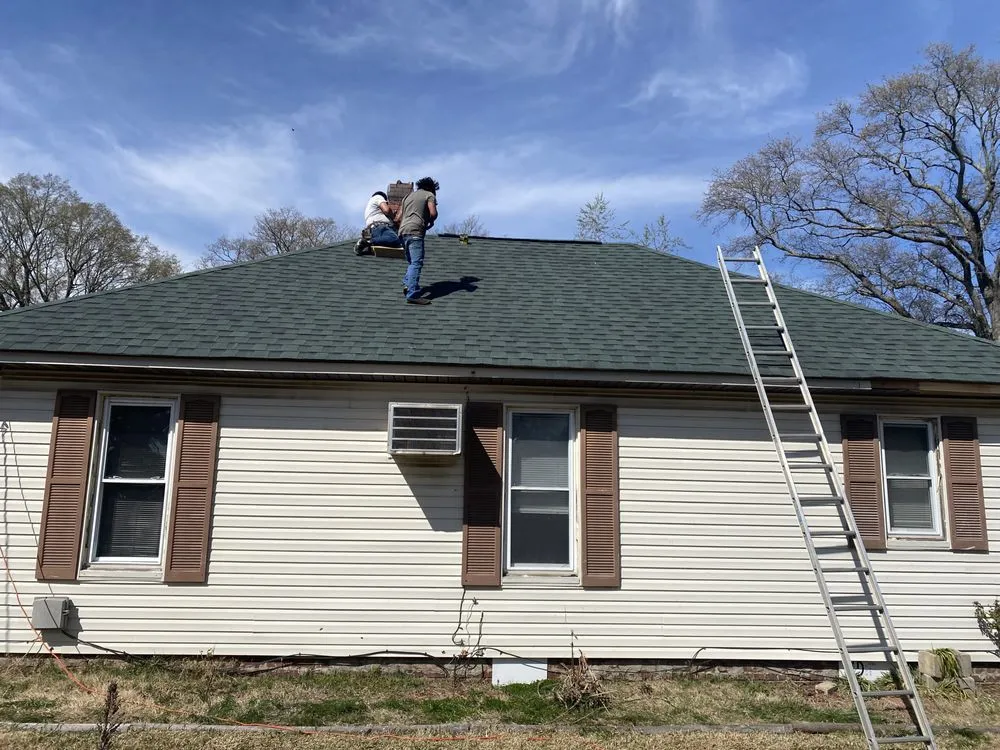 Slide of McCoy Roofing