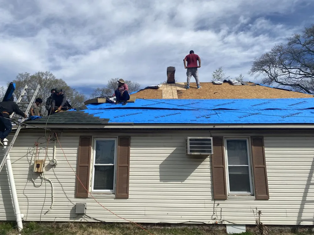 Slide of McCoy Roofing