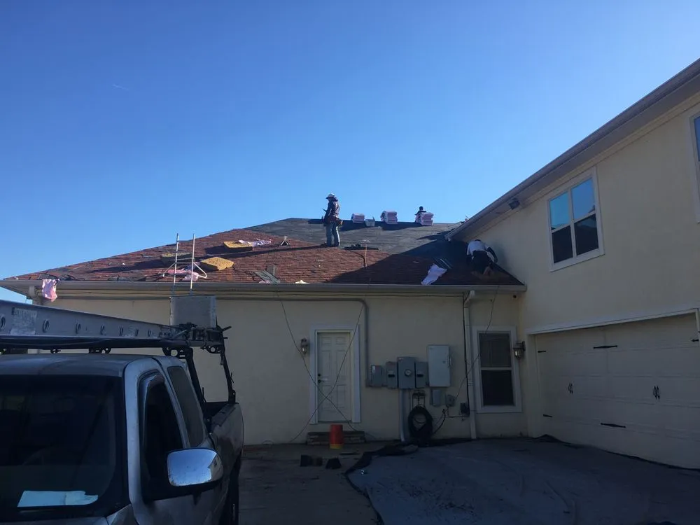 Slide of McCoy Roofing