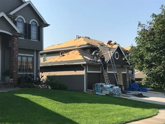 Slide of McCoy Roofing
