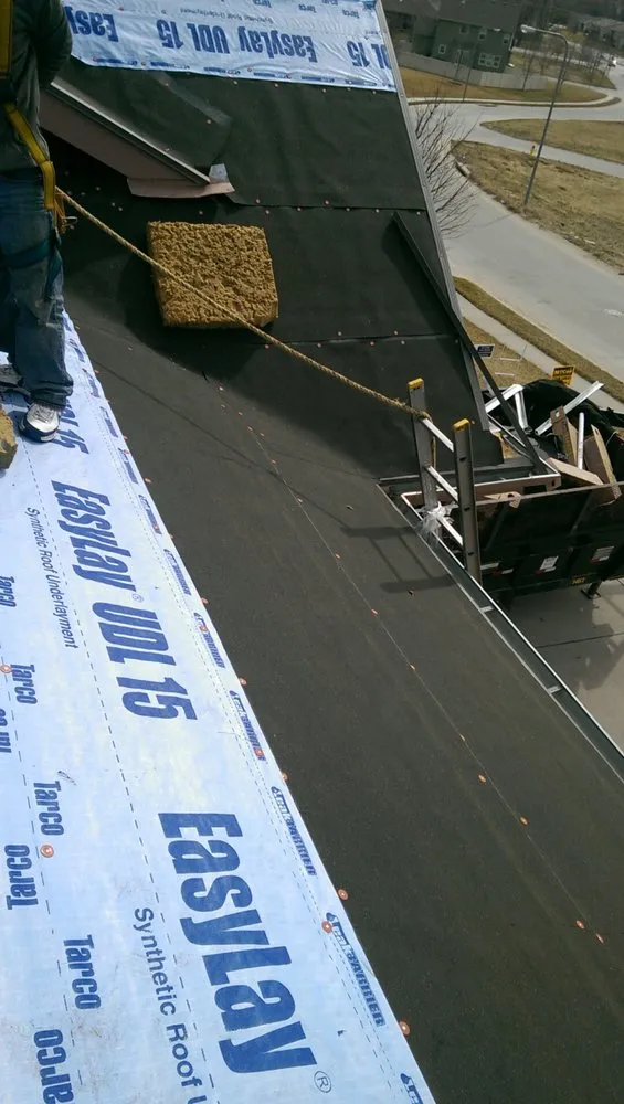 Slide of McCoy Roofing